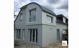 Extension en bois d'une maison à Carolles (50740).