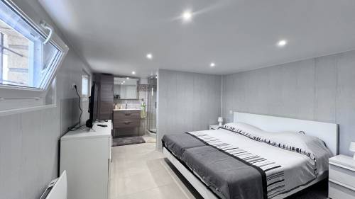 Garage transformé en chambre à coucher