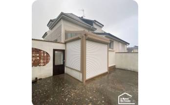 Extension de maison beige 