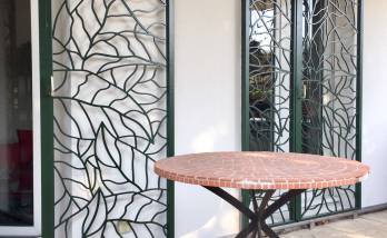 Réalisation de grilles de défense sur-mesure en métal ajouré appartement en rez-de-jardin Lyon 9ème arrondissement Vaise