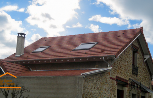 Toiture rénové en tuile plat