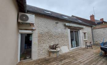 Façade rénovée en pierre apparente