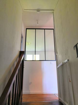 Verrière d'atelier posée pour plus de luminosité dans l'escalier