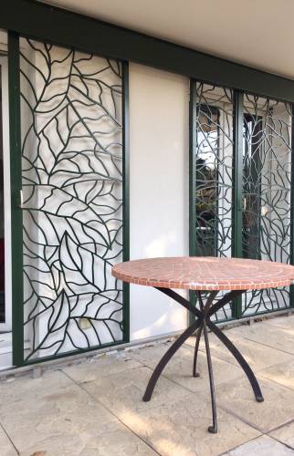 Réalisation de grilles de défense sur-mesure en métal ajouré appartement en rez-de-jardin Lyon 9ème arrondissement Vaise