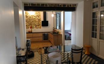 Ouverture mur porteur IPN et pierres apparentes