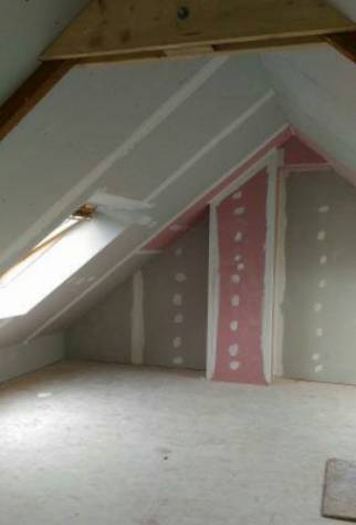 Plaques de plâtre ignifugées autour du conduit de cheminée