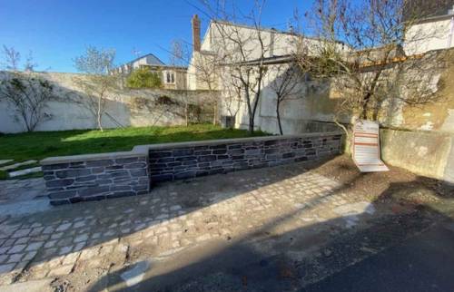 Pose d'un mur à Deauville