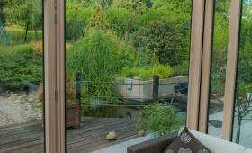 Rénovation de maison en meulière avec extension verre et bois à Pournoy-la-Grasse 57 420