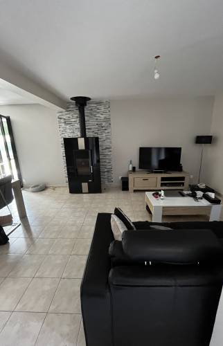 Poêle à bois salon/salle à manger après rénovation  
