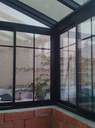 Petite véranda d'entrée à Sainte Foy Lès Lyon