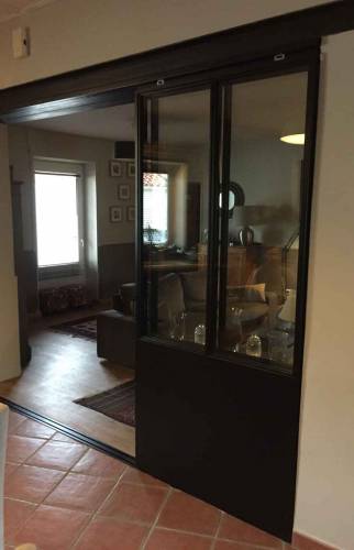 Création d'une verrière en aluminium afin de délimiter les pièces tout en conservant un espace ouvert