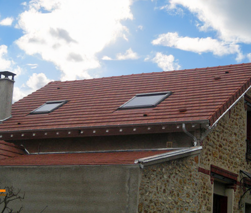 Toiture rénové en tuile plat