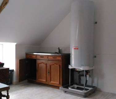 installation du chauffe-eau électrique, modification des réseaux d'alimentation en eau et évacuations