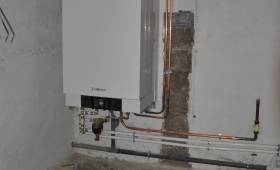 Chaudière à gaz haute performance posée en rénovation énergétique de maison - Servon 77170