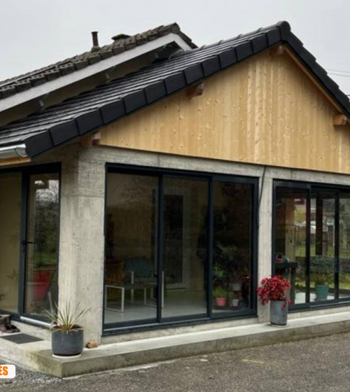 véranda Sallanches, extension maison Sallanches, rénovation véranda montagne, pose baie vitrée Sallanches, artisan charpente couverture, La Maison des Travaux Chamonix Mont-Blanc