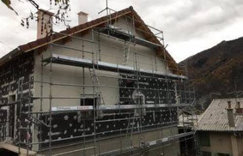 Début de la pose d'enduit