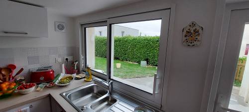 Remplacement des anciennes fenêtres bois par des fenêtres et portes en aluminium coulissantes