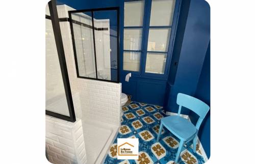 Installation d’une paroi de douche style verrière