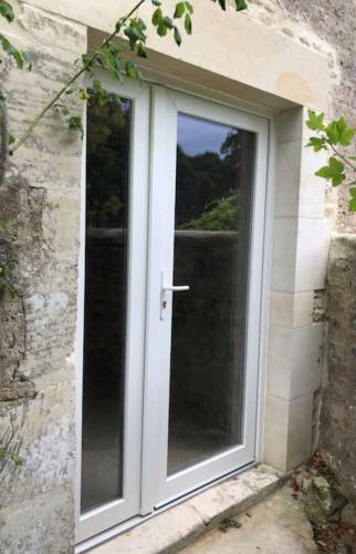 Remplacement de la porte d'une maison à Trouville