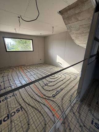  Installation de chauffage avec pose d'un plancher chauffant - Alixan 26300