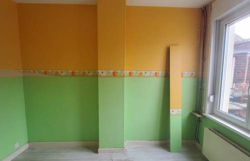 Avant travaux : ancienne cheminée dans une chambre à Harnes.