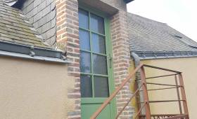 Après : arrière de l'immeuble locatif