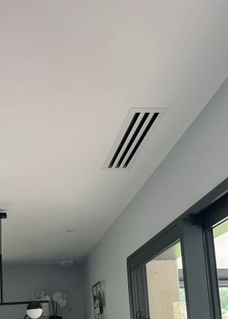 Installation de climatisation gainable avec bouche de diffusion d'air - Ambérieu-en-Bugey 01500