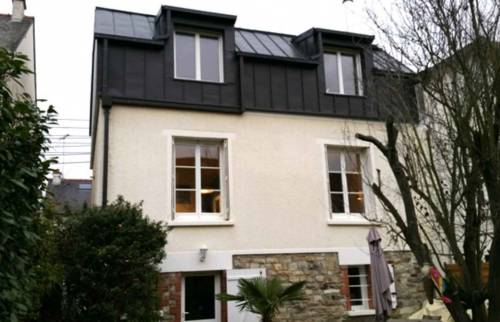 Surélévation maison façade arrière