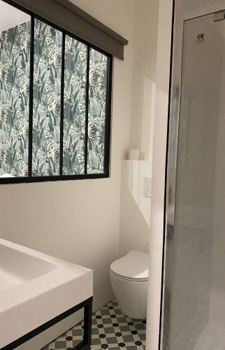 Extension pour accueillir un garage et une suite parentale au sein d'une maison bordelaise.