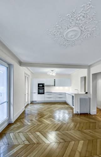 Cuisine moderne ouverte sur le salon à Paris 16e