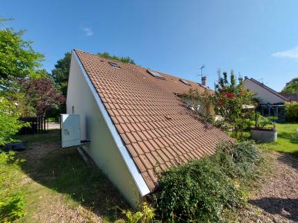 Débord de toiture en zinc