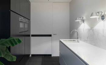 Cuisine en noir et blanc moderne et épurée Plaine Monceau