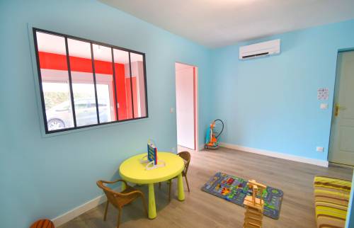 Création d'une salle de jeux dans un garage à Champier