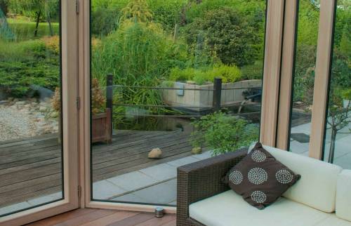 Profiter de sa véranda dans un canapé