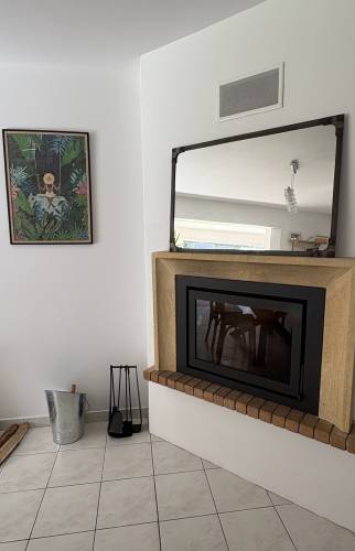 Insert de poêle installé dans une cheminée existante à Bruz