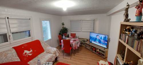 Nouveau salon séjour avec revêtement de sol en lame PVC sur chape neuve, changement des menuiseries PVC double vitrage