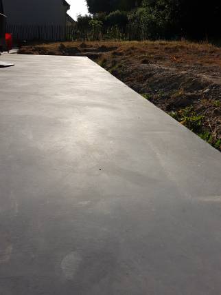 Terrasse en béton teinté et surfacé