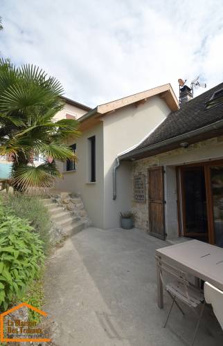 extension moderne maison pierre