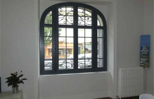 Installation fenêtre cintrée