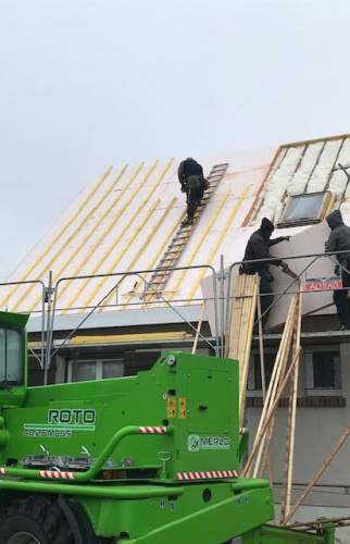 Pose des panneaux sarking