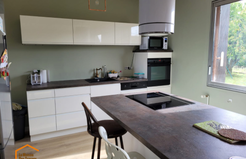 Rénovation cuisine avec îlot central à Dole