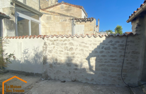 APRES Muret en pierre rénové à la chaux