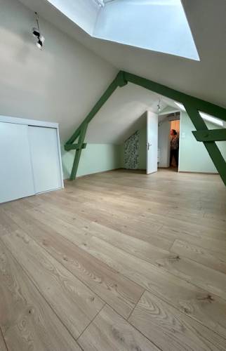 Aménagement de combles pour une maison à Troyes poutres