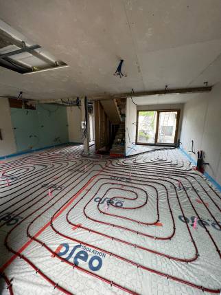 Installation d’un plancher chauffant dans une maison située à Motte Servolex