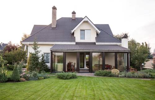 Extension par une véranda vu de l'extérieur