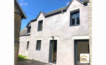 Rénovation d'une façade à Ouville (50210).