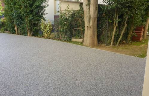 Aménagement extérieur avec pose d'un sol en moquette de pierre - Préfailles 44770