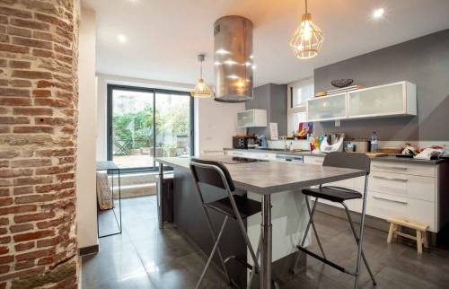 Travaux de maçonnerie pour agrandir une ouverture et poser une baie vitrée, maison dans l'ouest de Lyon, vallée de l'Azergues