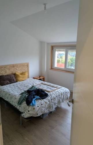 Chambre rénovée dans les combles d’une maison à La Murette