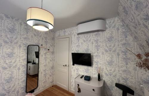 Climatisation réversible dans une autre chambrechambre